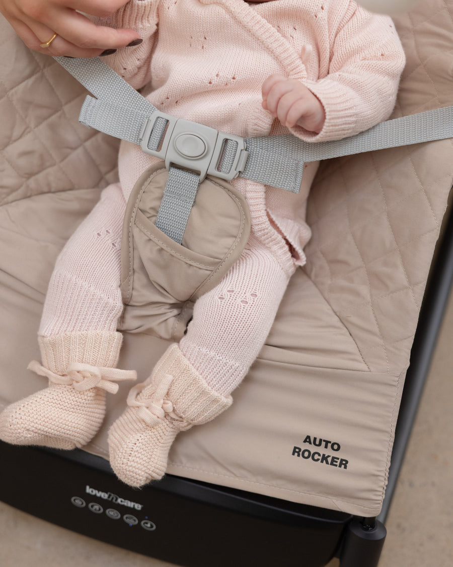 Auto Rocker — Beige — harness detail with baby