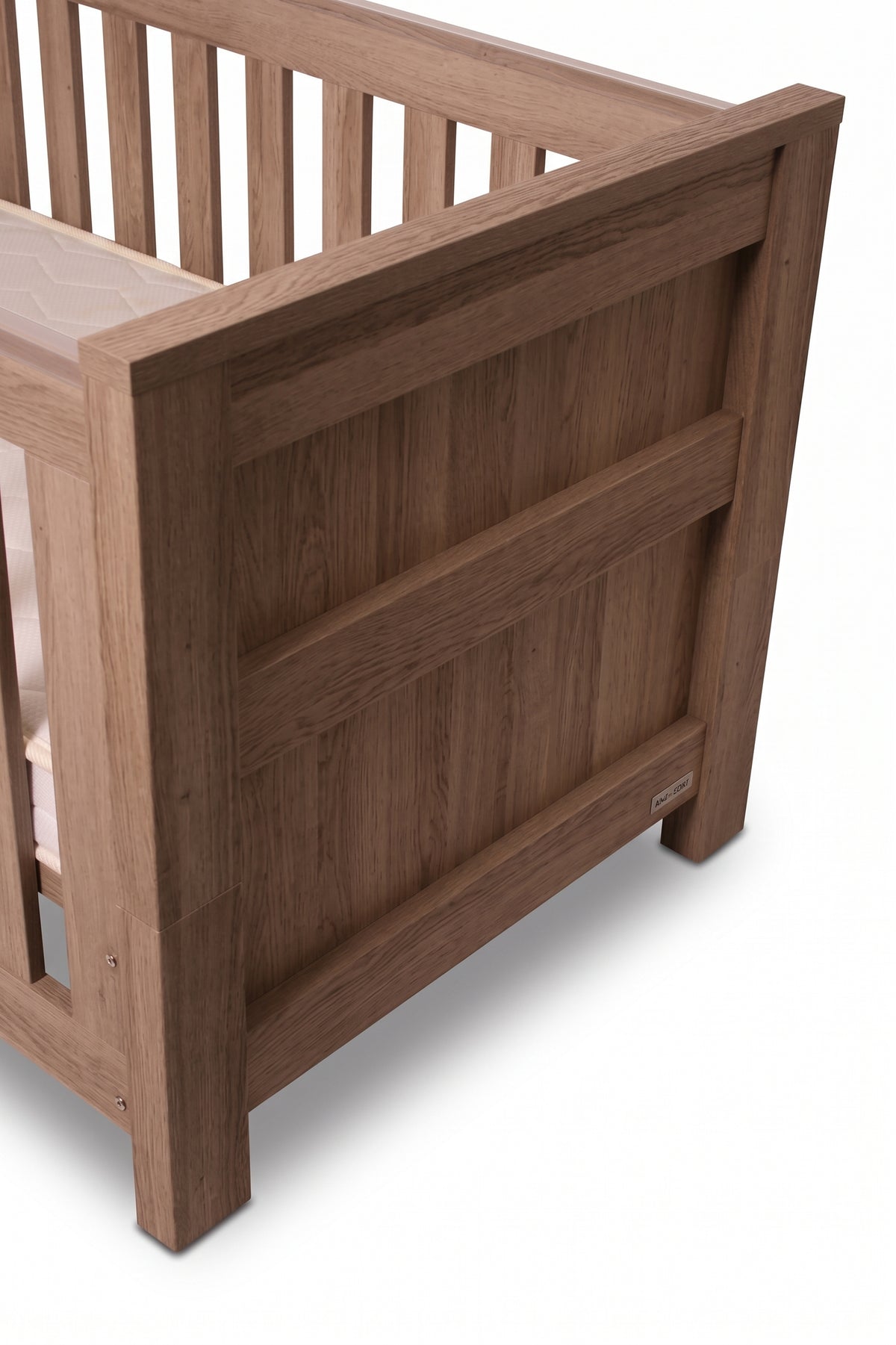 Bordeaux Cot — Hushed Brown Oak — end panel detail