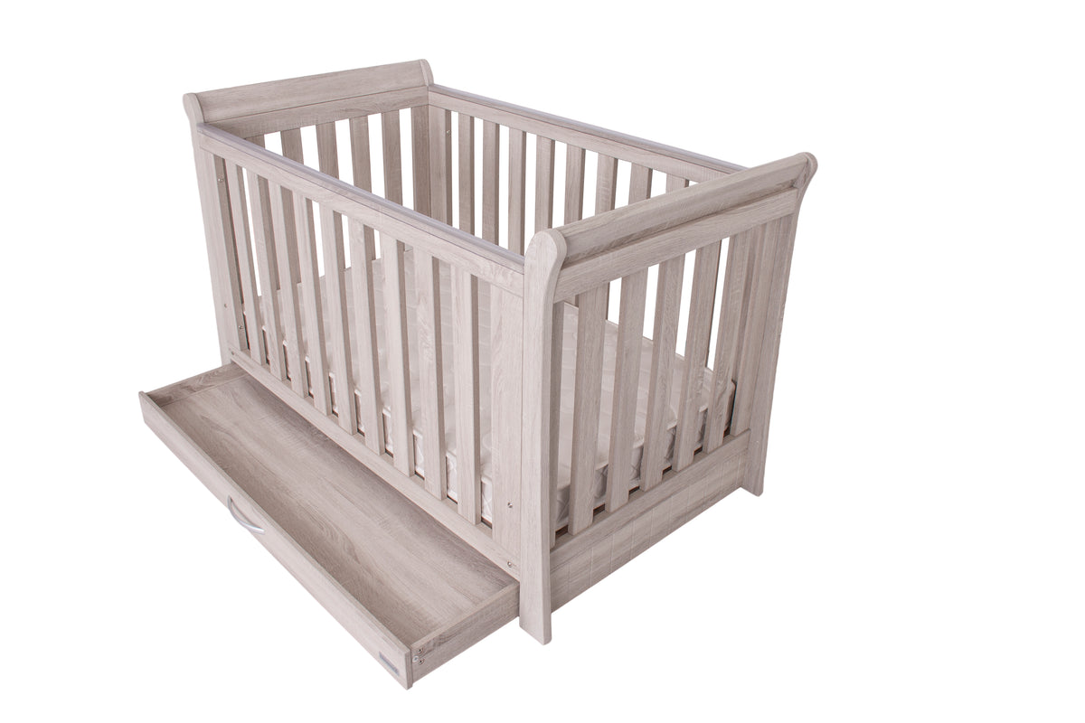 Noble Cot — drawer open, angle