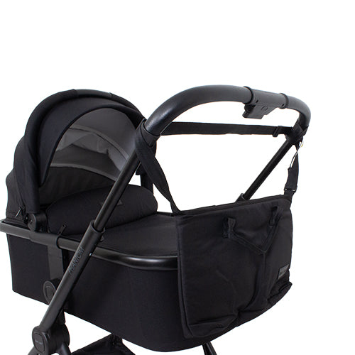 Phantom Nursery Bag — Black — slotted onto the stroller