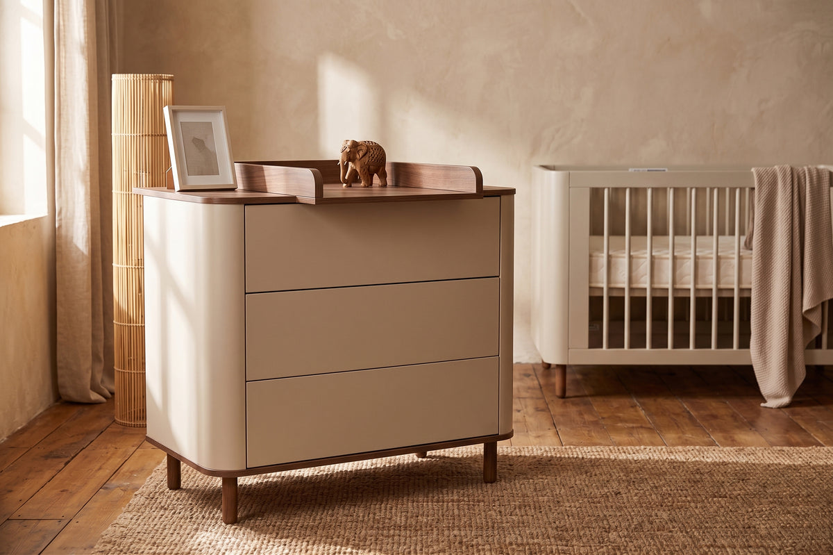 Kenva Chest — with the Kenva Cot in a nursery, close view