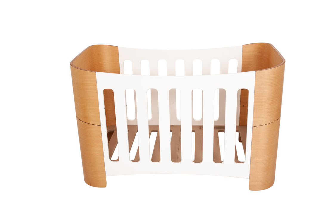 Vulu Cot — Sculpted timber